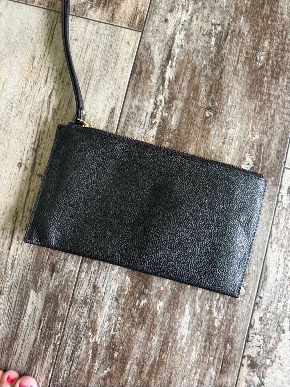 Michael Kors black pebbled leather jet set wristlet purse - gold logo.
